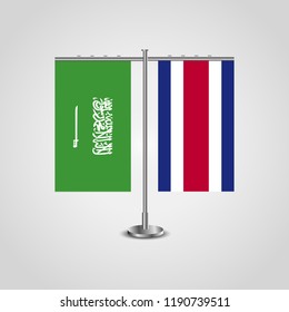Table stand with flags of Saudi Arabia and Costa Rica.Two flag. Flag pole. Symbolizing the cooperation between the two countries. Table flags