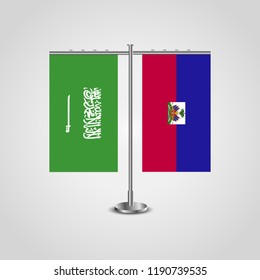 Table stand with flags of Saudi Arabia and Haiti.Two flag. Flag pole. Symbolizing the cooperation between the two countries. Table flags