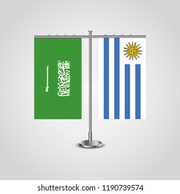 Table stand with flags of Saudi Arabia and Uruguay.Two flag. Flag pole. Symbolizing the cooperation between the two countries. Table flags