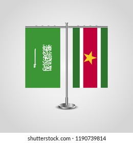 Table stand with flags of Saudi Arabia and Suriname.Two flag. Flag pole. Symbolizing the cooperation between the two countries. Table flags