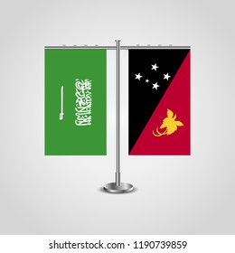 Table stand with flags of Saudi Arabia and Papua New Guinea.Two flag. Flag pole. Symbolizing the cooperation between the two countries. Table flags