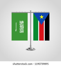 Table stand with flags of Saudi Arabia and Southern Sudan.Two flag. Flag pole. Symbolizing the cooperation between the two countries. Table flags