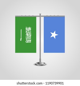 Table stand with flags of Saudi Arabia and Somalia.Two flag. Flag pole. Symbolizing the cooperation between the two countries. Table flags