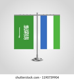 Table stand with flags of Saudi Arabia and Sierra Leone.Two flag. Flag pole. Symbolizing the cooperation between the two countries. Table flags