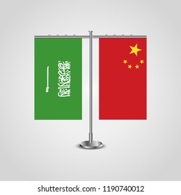 Table stand with flags of Saudi Arabia and China.Two flag. Flag pole. Symbolizing the cooperation between the two countries. Table flags