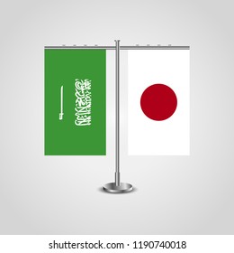 Table stand with flags of Saudi Arabia and Japan.Two flag. Flag pole. Symbolizing the cooperation between the two countries. Table flags