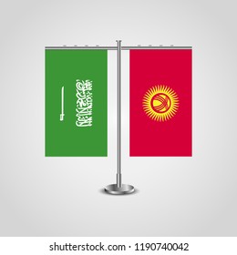 Table stand with flags of Saudi Arabia and Kyrgyzstan.Two flag. Flag pole. Symbolizing the cooperation between the two countries. Table flags