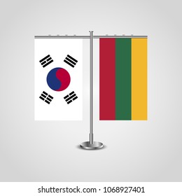 Table stand with flags of South Korea and Lithuania.Two flag. Flag pole. Symbolizing the cooperation between the two countries. Table flags