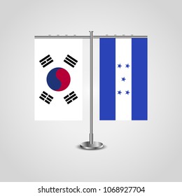 Table stand with flags of South Korea and Honduras.Two flag. Flag pole. Symbolizing the cooperation between the two countries. Table flags