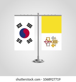 Table stand with flags of South Korea and Vatican.Two flag. Flag pole. Symbolizing the cooperation between the two countries. Table flags