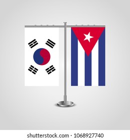 Table stand with flags of South Korea and Cuba.Two flag. Flag pole. Symbolizing the cooperation between the two countries. Table flags