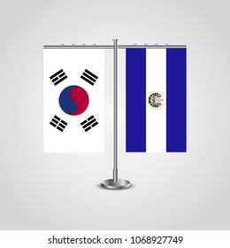 Table stand with flags of South Korea and El Salvador.Two flag. Flag pole. Symbolizing the cooperation between the two countries. Table flags