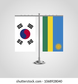 Table stand with flags of South Korea and Rwanda.Two flag. Flag pole. Symbolizing the cooperation between the two countries. Table flags