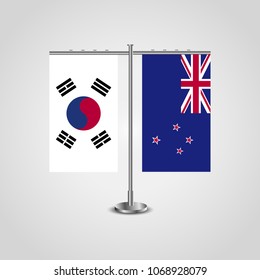 Table stand with flags of South Korea and New Zealand.Two flag. Flag pole. Symbolizing the cooperation between the two countries. Table flags
