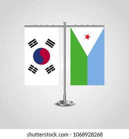 Table stand with flags of South Korea and Djibouti.Two flag. Flag pole. Symbolizing the cooperation between the two countries. Table flags