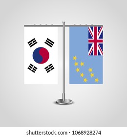 Table stand with flags of South Korea and Tuvalu.Two flag. Flag pole. Symbolizing the cooperation between the two countries. Table flags
