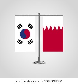 Table stand with flags of South Korea and Bahrain.Two flag. Flag pole. Symbolizing the cooperation between the two countries. Table flags