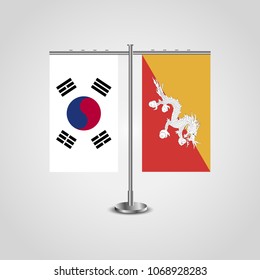 Table stand with flags of South Korea and Butane.Two flag. Flag pole. Symbolizing the cooperation between the two countries. Table flags