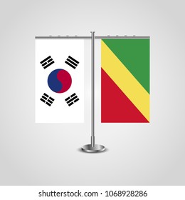 Table stand with flags of South Korea and Republic of the Congo.Two flag. Flag pole. Symbolizing the cooperation between the two countries. Table flags