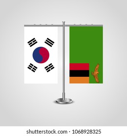 Table stand with flags of South Korea and Zambia.Two flag. Flag pole. Symbolizing the cooperation between the two countries. Table flags