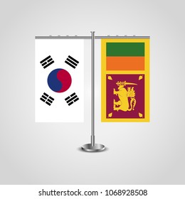 Table stand with flags of South Korea and Sri Lanka.Two flag. Flag pole. Symbolizing the cooperation between the two countries. Table flags