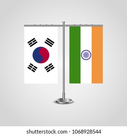 Table stand with flags of South Korea and India.Two flag. Flag pole. Symbolizing the cooperation between the two countries. Table flags