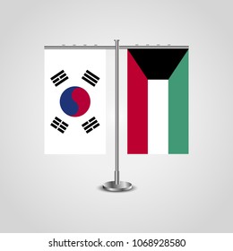 Table stand with flags of South Korea and Kuwait.Two flag. Flag pole. Symbolizing the cooperation between the two countries. Table flags