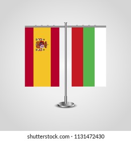 Table stand with flags of Spain and Bulgaria.Two flag. Flag pole. Symbolizing the cooperation between the two countries. Table flags
