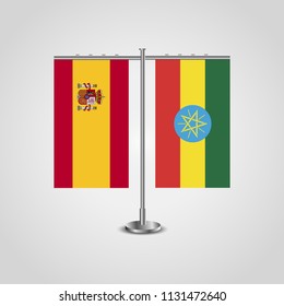 Table stand with flags of Spain and Ethiopia.Two flag. Flag pole. Symbolizing the cooperation between the two countries. Table flags
