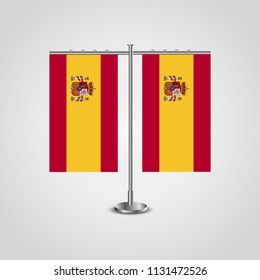Table stand with flags of Spain and Spain.Two flag. Flag pole. Symbolizing the cooperation between the two countries. Table flags
