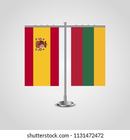 Table stand with flags of Spain and Lithuania.Two flag. Flag pole. Symbolizing the cooperation between the two countries. Table flags