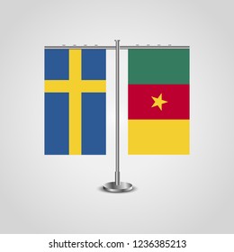 Table stand with flags of Sweden and Cameroon.Two flag. Flag pole. Symbolizing the cooperation between the two countries. Table flags