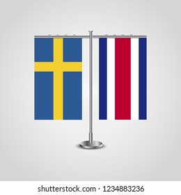 Table stand with flags of Sweden and Costa Rica.Two flag. Flag pole. Symbolizing the cooperation between the two countries. Table flags

