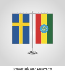 Table stand with flags of Sweden and Ethiopia.Two flag. Flag pole. Symbolizing the cooperation between the two countries. Table flags