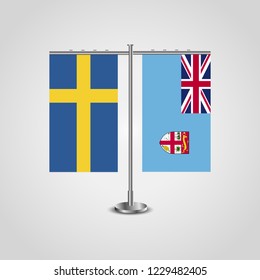 Table stand with flags of Sweden and Fiji.Two flag. Flag pole. Symbolizing the cooperation between the two countries. Table flags