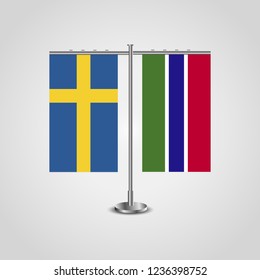 Table stand with flags of Sweden and Gambia.Two flag. Flag pole. Symbolizing the cooperation between the two countries. Table flags
