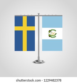 Table stand with flags of Sweden and Guatemala.Two flag. Flag pole. Symbolizing the cooperation between the two countries. Table flags