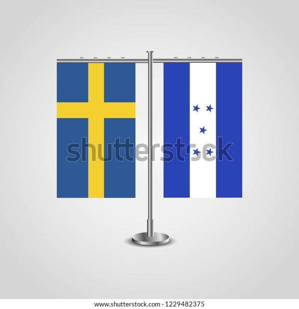 Table stand with flags of Sweden and Honduras.Two\
flag. Flag pole. Symbolizing the cooperation between the two\
countries. Table flags