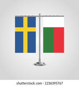 Table stand with flags of Sweden and Madagascar.Two flag. Flag pole. Symbolizing the cooperation between the two countries. Table flags