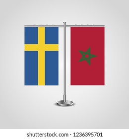 Table stand with flags of Sweden and Morocco.Two flag. Flag pole. Symbolizing the cooperation between the two countries. Table flags