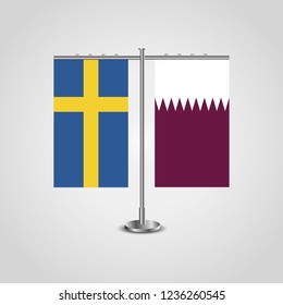 Table stand with flags of Sweden and Qatar.Two flag. Flag pole. Symbolizing the cooperation between the two countries. Table flags