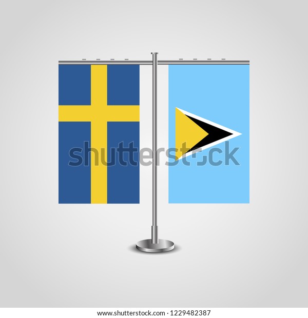 Table stand with flags of Sweden and Saint\
Lucia.Two flag. Flag pole. Symbolizing the cooperation between the\
two countries. Table\
flags