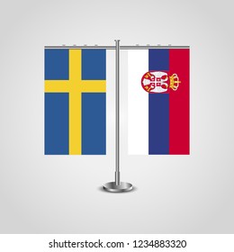 Table stand with flags of Sweden and Serbia.Two flag. Flag pole. Symbolizing the cooperation between the two countries. Table flags

