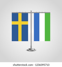 Table stand with flags of Sweden and Sierra Leone.Two flag. Flag pole. Symbolizing the cooperation between the two countries. Table flags

