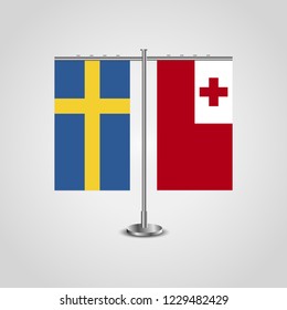 Table stand with flags of Sweden and Tonga.Two flag. Flag pole. Symbolizing the cooperation between the two countries. Table flags