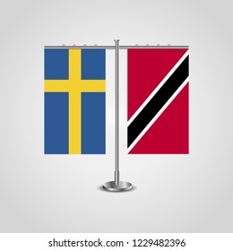 Table stand with flags of Sweden and Trinidad and Tobago.Two flag. Flag pole. Symbolizing the cooperation between the two countries. Table flags