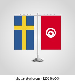 Table stand with flags of Sweden and Tunisia.Two flag. Flag pole. Symbolizing the cooperation between the two countries. Table flags