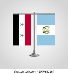 Table stand with flags of Syria and Guatemala.Two flag. Flag pole. Symbolizing the cooperation between the two countries. Table flags