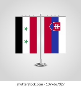 Table stand with flags of Syria and Slovakia.Two flag. Flag pole. Symbolizing the cooperation between the two countries. Table flags
