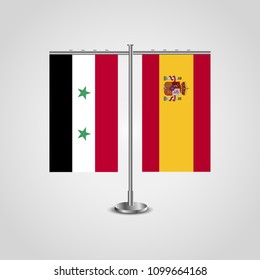Table stand with flags of Syria and Spain.Two flag. Flag pole. Symbolizing the cooperation between the two countries. Table flags
